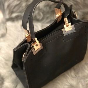 N.A.J.G. Black Handbag w/ gold accents